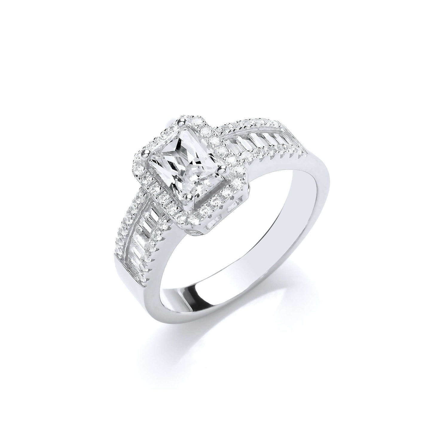 Silver Engagement Ring with emerald cut stone, halo surround, and baguette cut cubic zirconia accents.