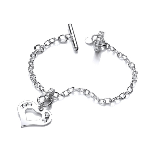 Silver bracelet with heart and foot charm on a white background