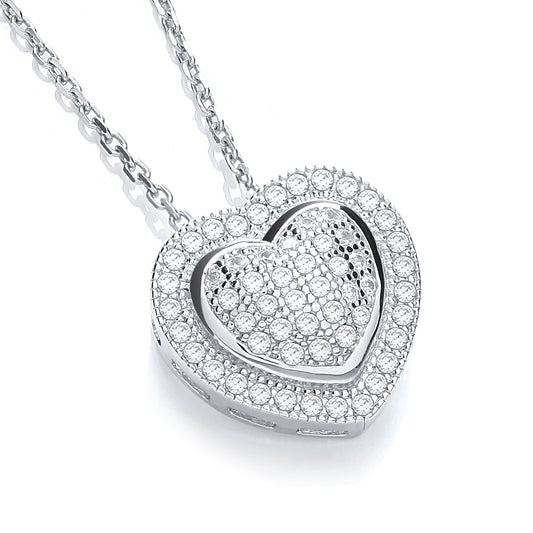 Heart-shaped silver necklace with clear stones on a white background