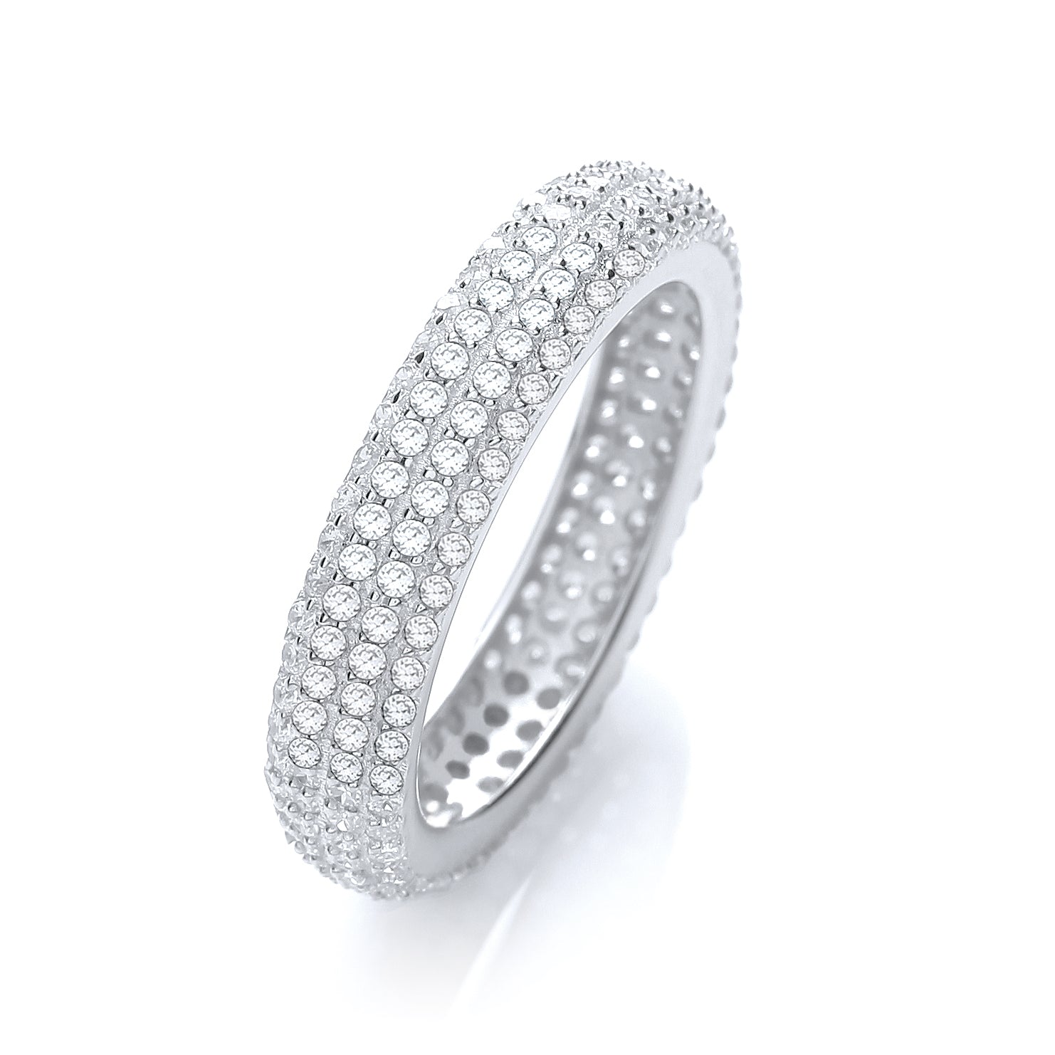 Silver ring with clear gemstones on a white background