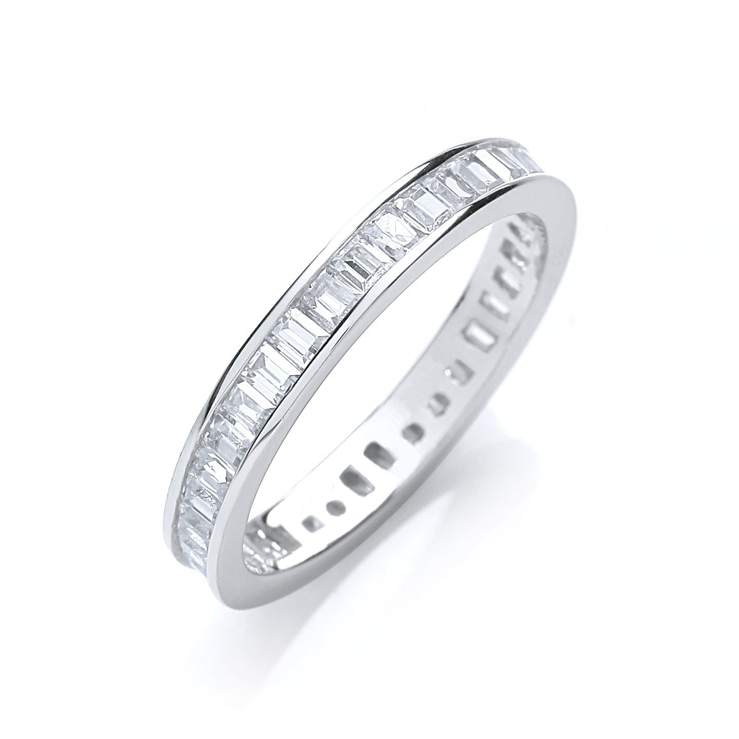 Silver ring with baguette-cut diamonds on a white background