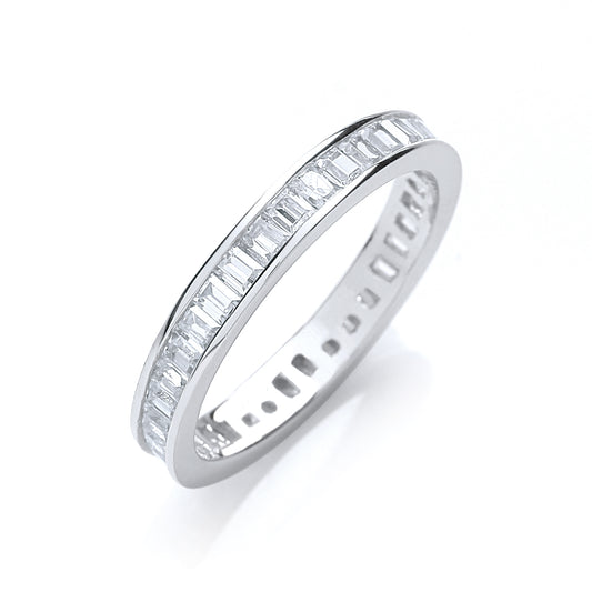 Silver ring with baguette-cut diamonds on a white background