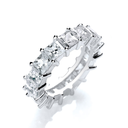 Diamond ring with princess-cut stones on a white background