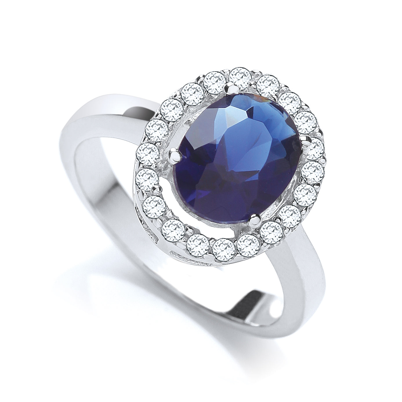 Elegant blue zirconia halo ring in silver, featuring a deep blue center stone encircled by sparkling accents, perfect for adding elegance to any look.