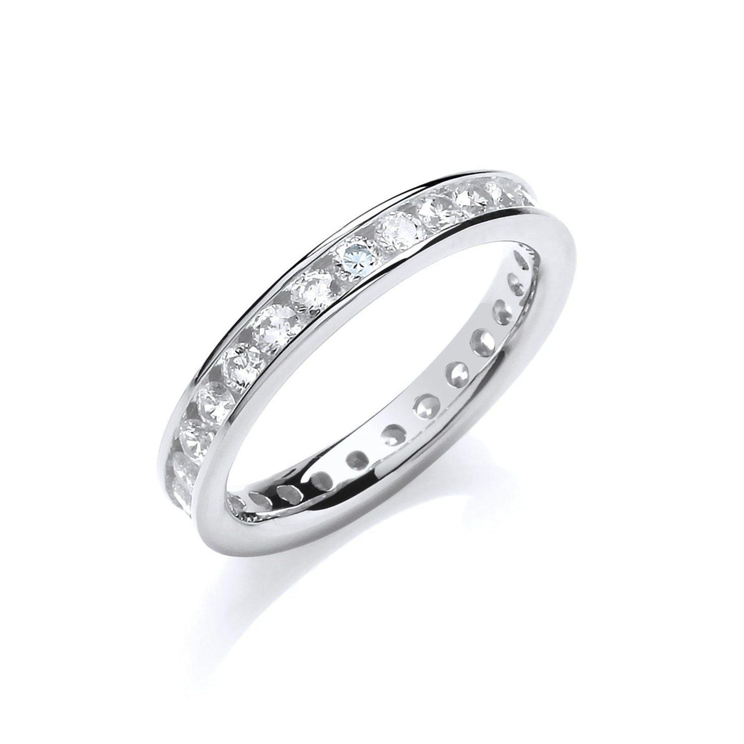 Silver ring with embedded diamonds on a white background
