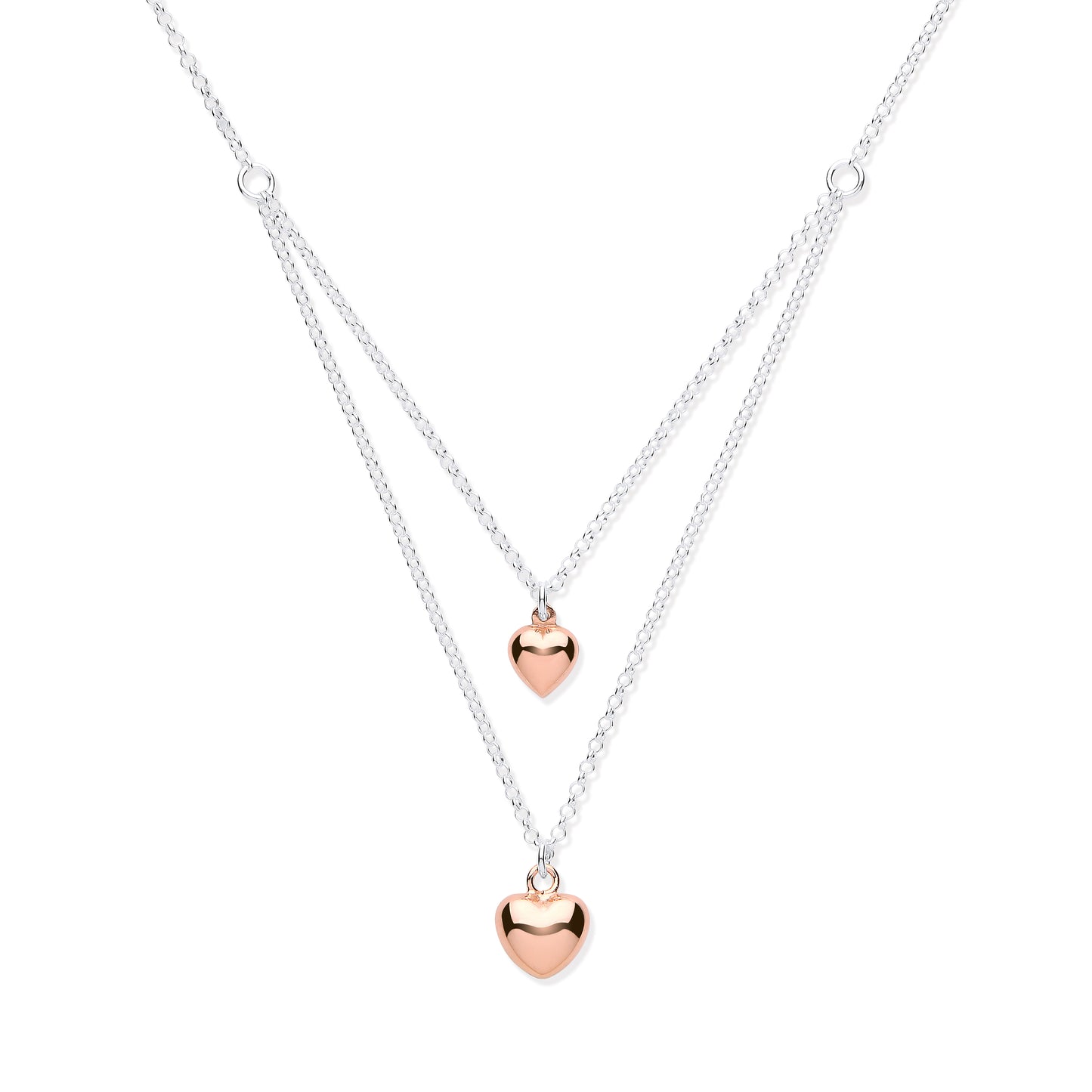 Two heart-shaped pendants on a silver chain against a white background