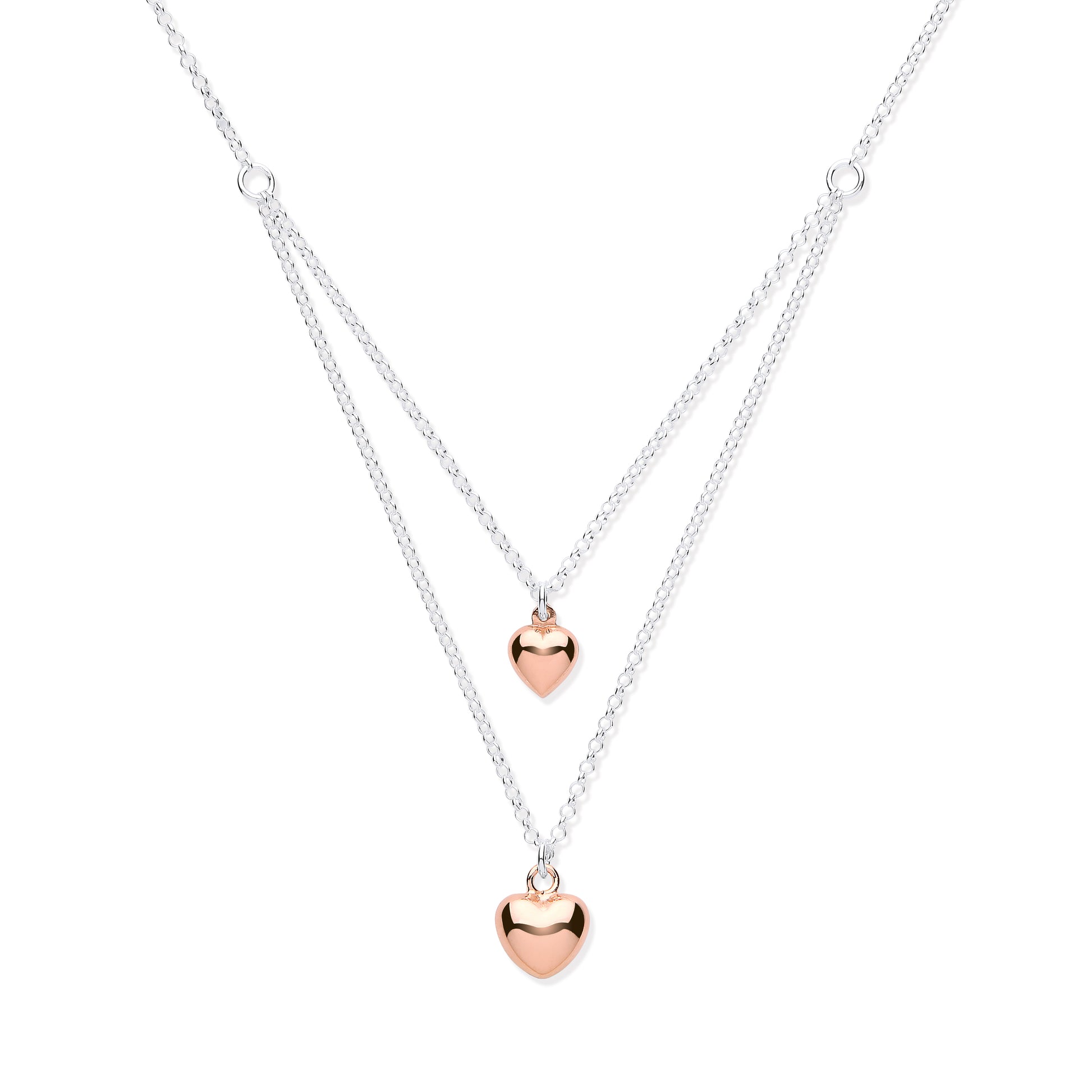Two heart-shaped pendants on a silver chain against a white background