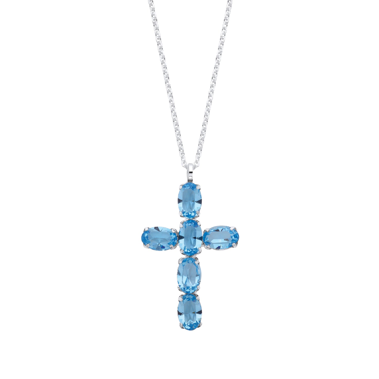 Cross-shaped pendant with blue gemstones on a white background