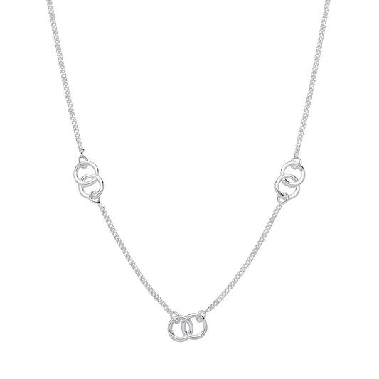 Silver necklace with interlocking rings on a white background