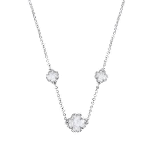 Necklace with three floral pendants on a white background