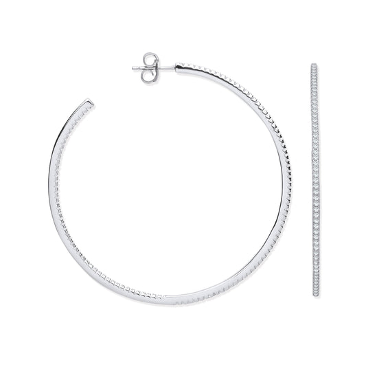 Silver hoop earrings on a white background
