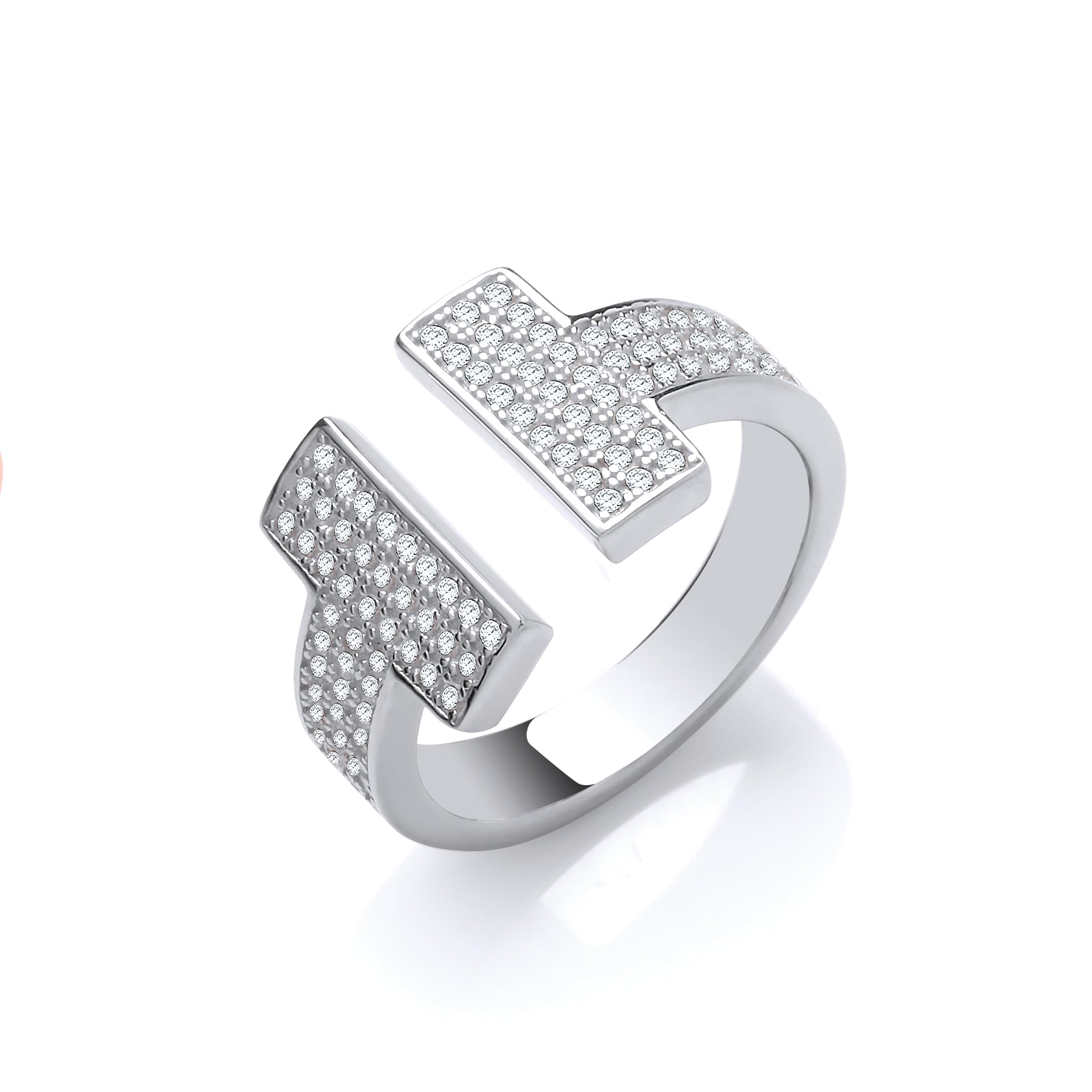 Silver ring with diamond accents on a white background