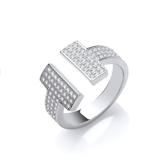 Silver ring with diamond accents on a white background