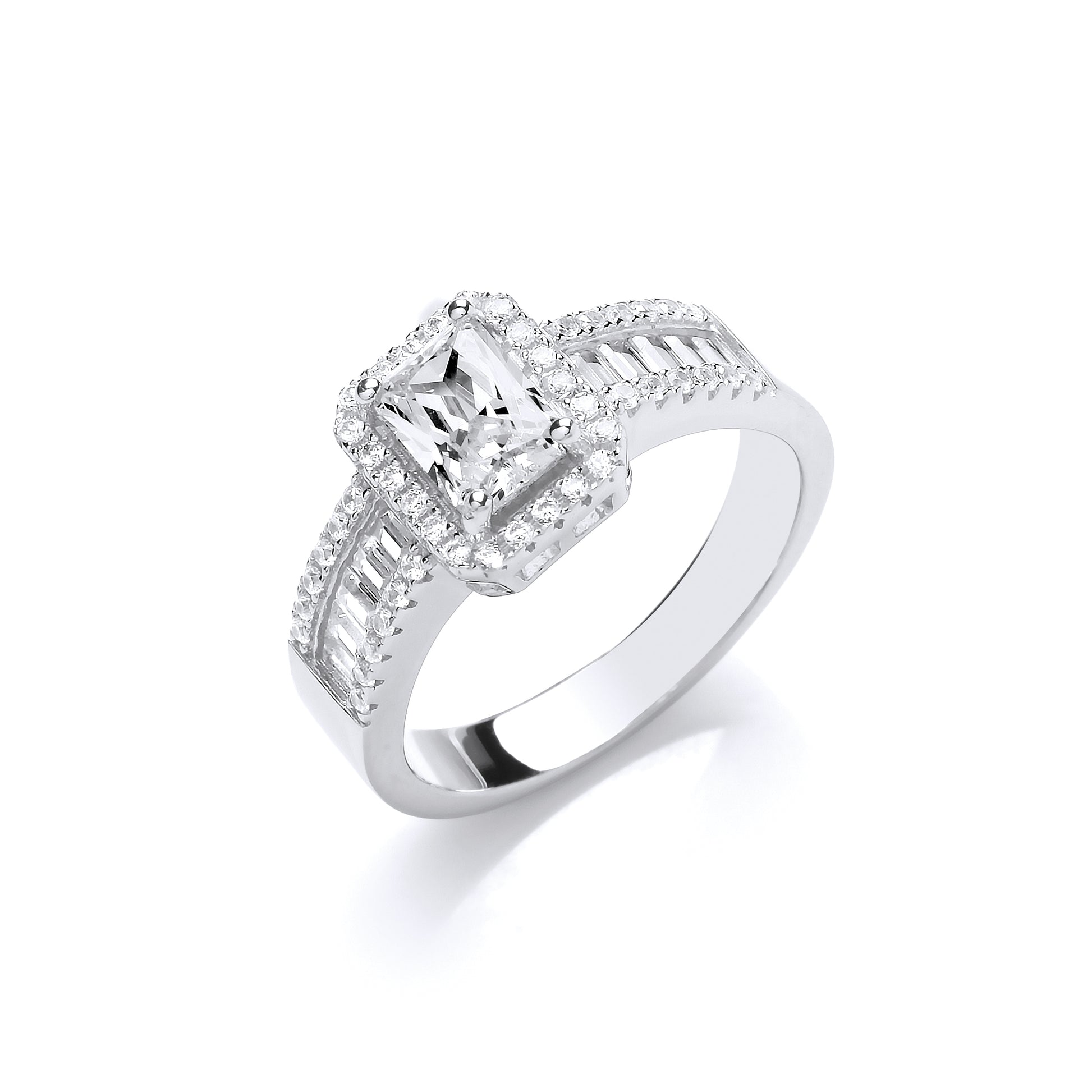 Silver ring with diamond accents on a white background