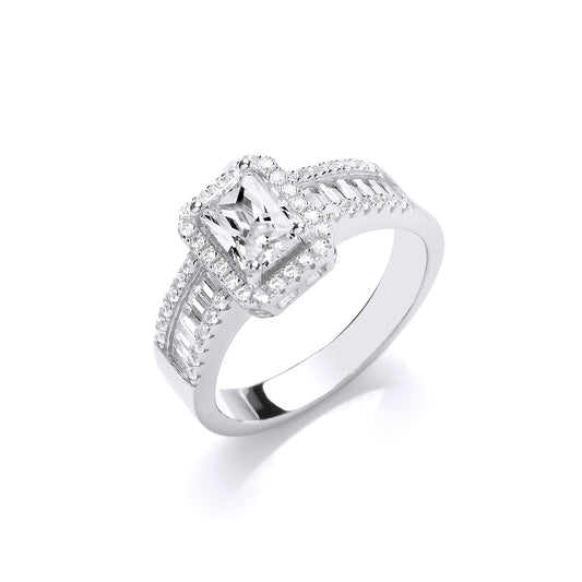 Silver ring with diamond accents on a white background