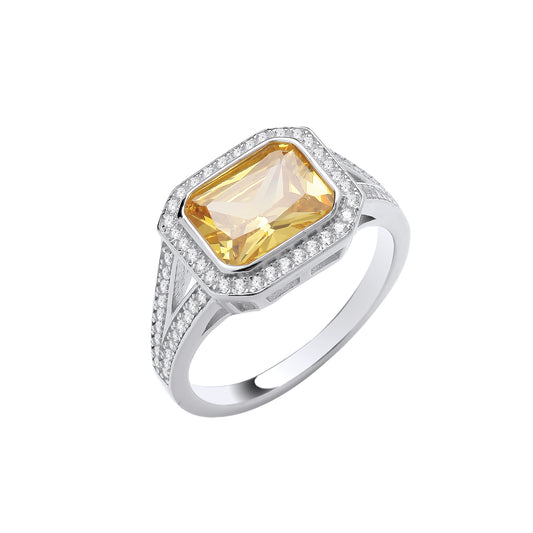 Silver ring with a yellow gemstone